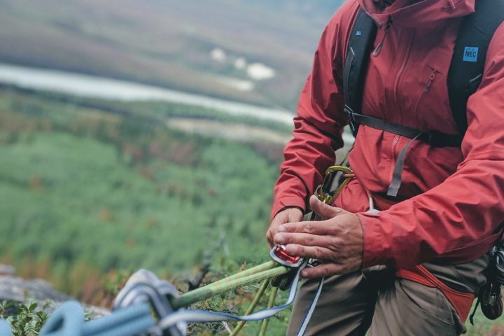 a person riding on the back of a bicycle