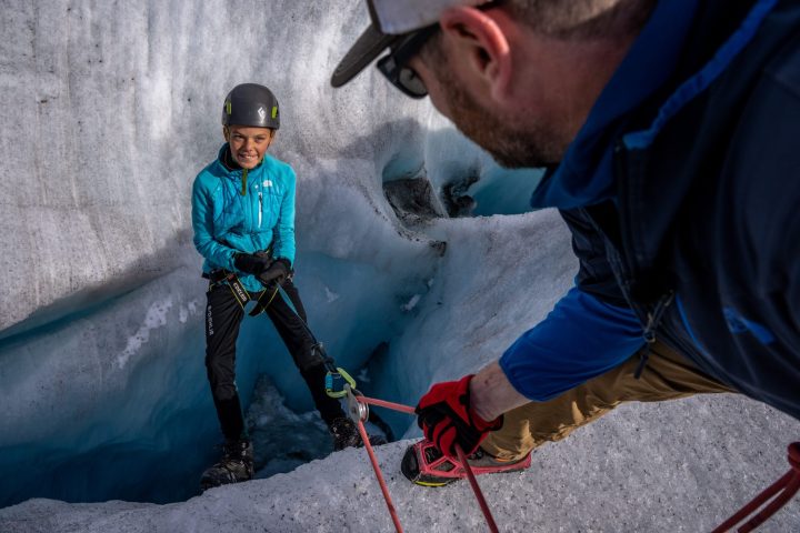 a man that is standing in the snow