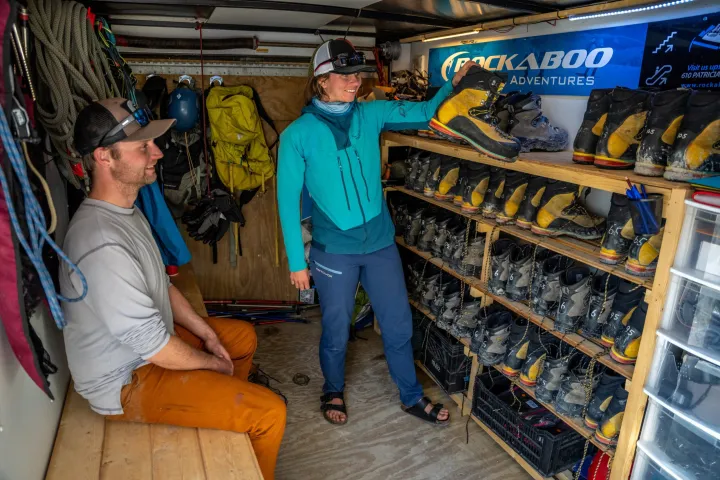 a group of people standing in front of a store