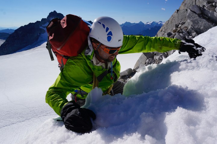 Man ice climbing