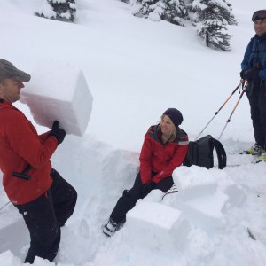 People learning how to be safe in the mountains during their AST1 Avalanche Safety Training