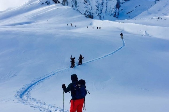 Backcountry skiers going down hill in Canada
