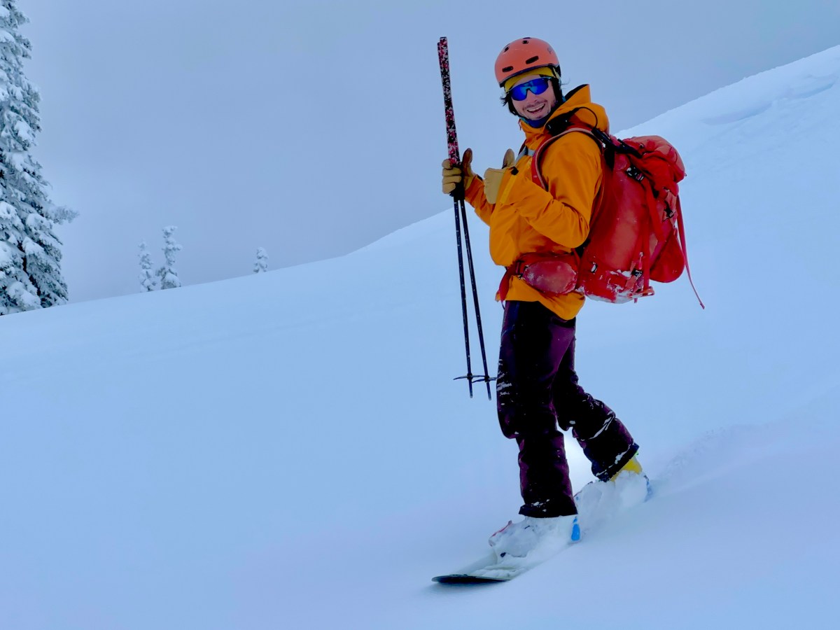 IMG_0529 a man riding skis down a snow covered slope